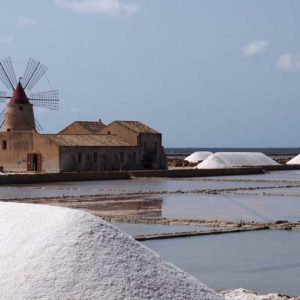 Salt pans drying in the sun and mounds of salt