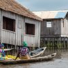 Women-on-boats-going-to-market-Benin-lake